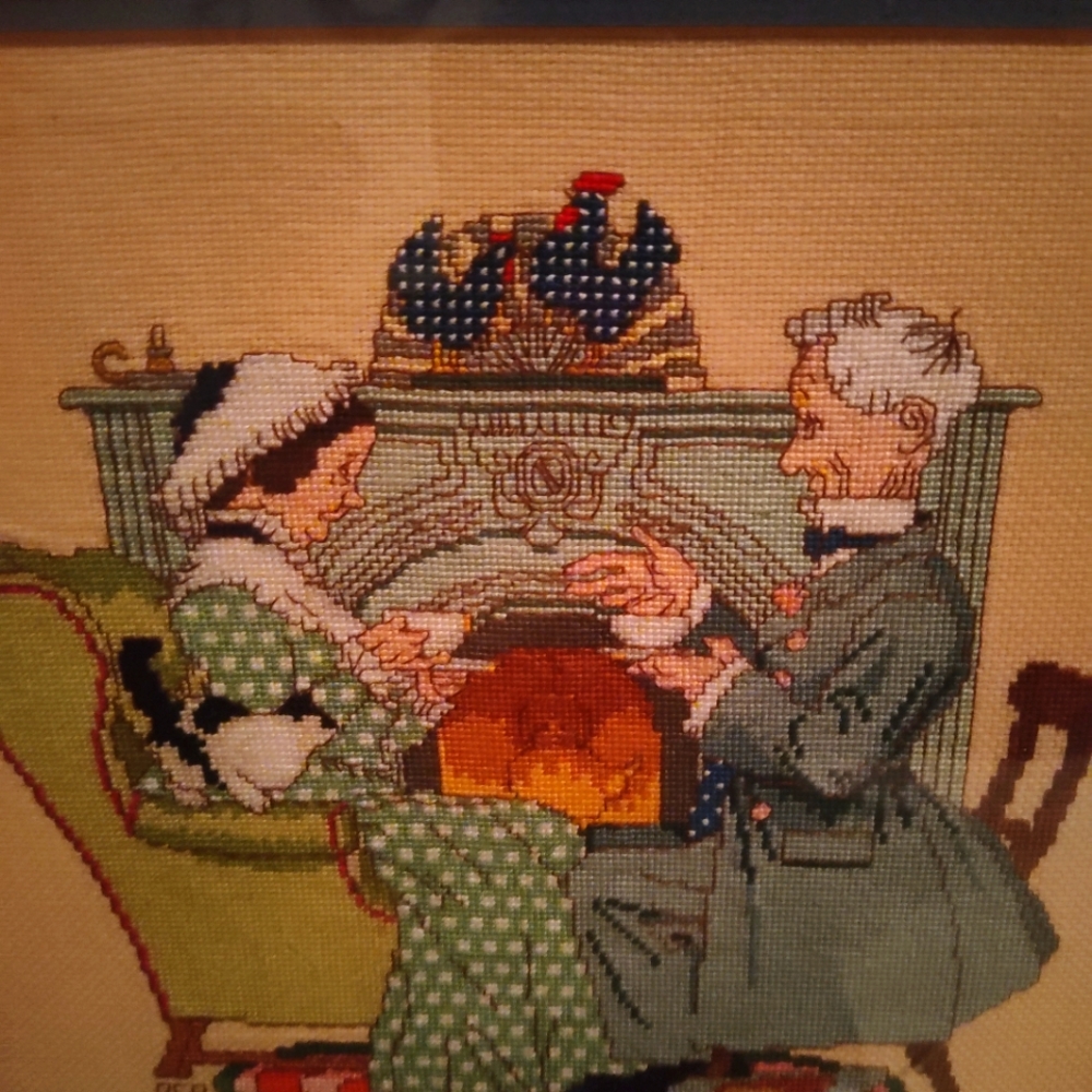 Norman Rockwell stitched art in frame